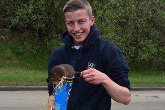 Joel Ireland and a water vole