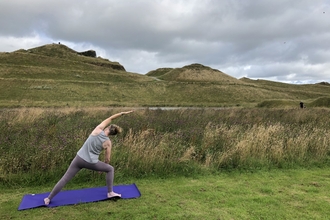 Yoga at Northumberlandia. Image by Michelle Perkins. 