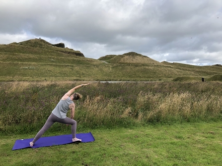 Yoga at Northumberlandia. Image by Michelle Perkins. 