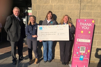 Sophie Webster, Catch My Drift Project Officer (second left) with members of the Co-op Amble team, image Co-op Amble