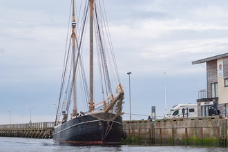 Boat in Amble Harbour. Image by Raven Montague.