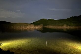 Northumberlandia by torchlight. Image by Alice McCourt.