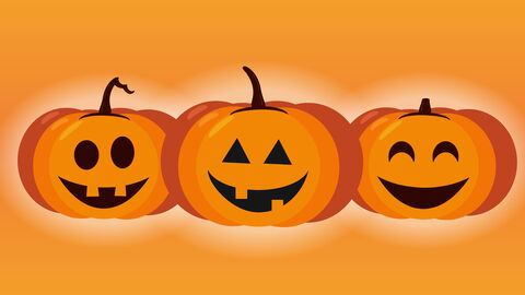Three smiling cartoon Halloween pumpkins with different jack-o’-lantern faces on an orange background.