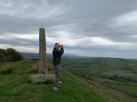 Conrad Dickinson, polar explorer and NWT president looking for birds at Bardon MIll. Image by Hilary Dickinson.